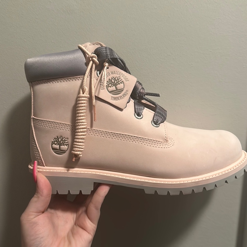 Brand new never worn Tim’s